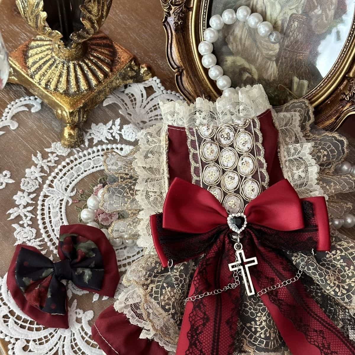 Customizable Vintage-Inspired Pet Dress in Deep Red with Black Lace and Charm Accents