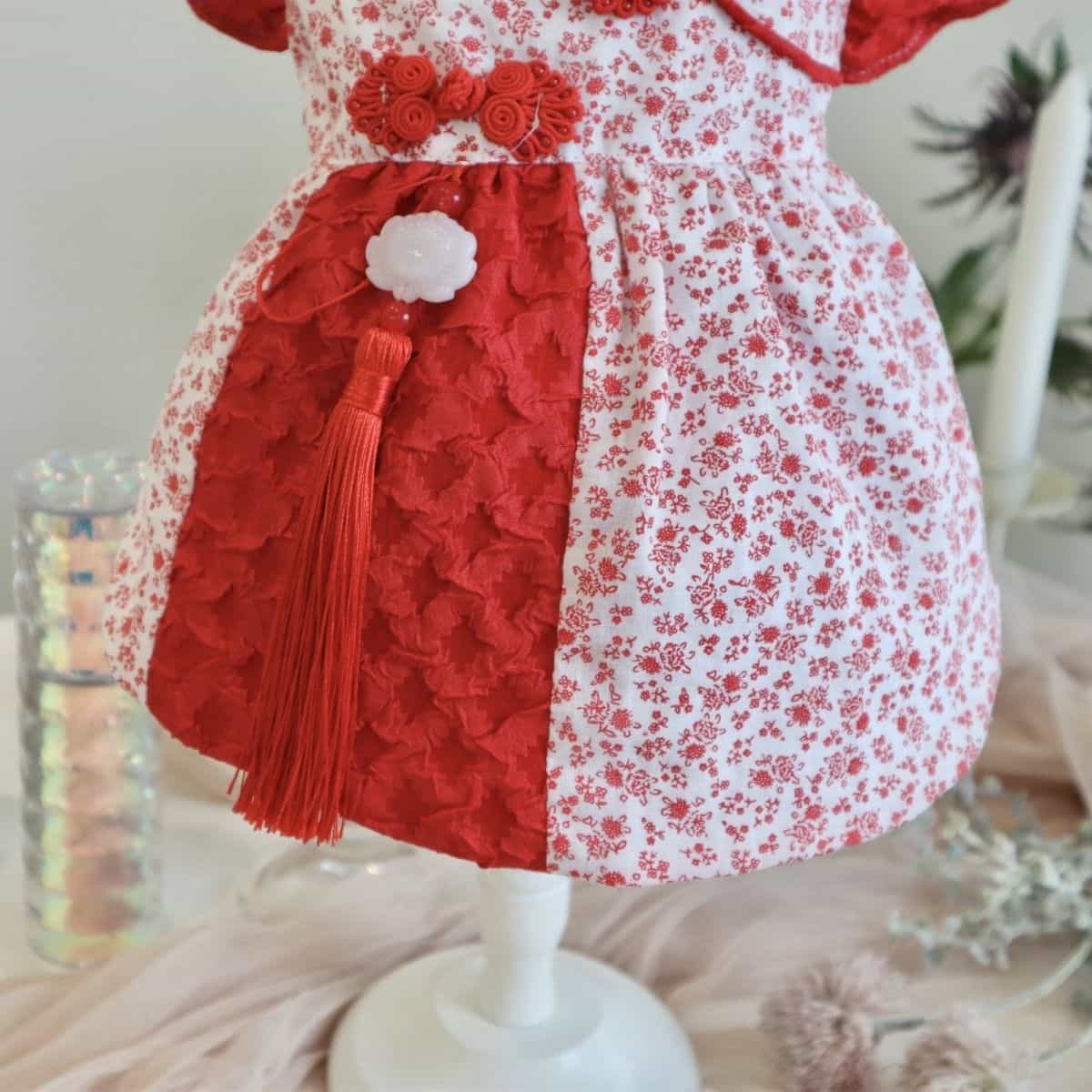 Customizable Adorable Pet Dress in Red and White Floral Pattern with Tassel Accents